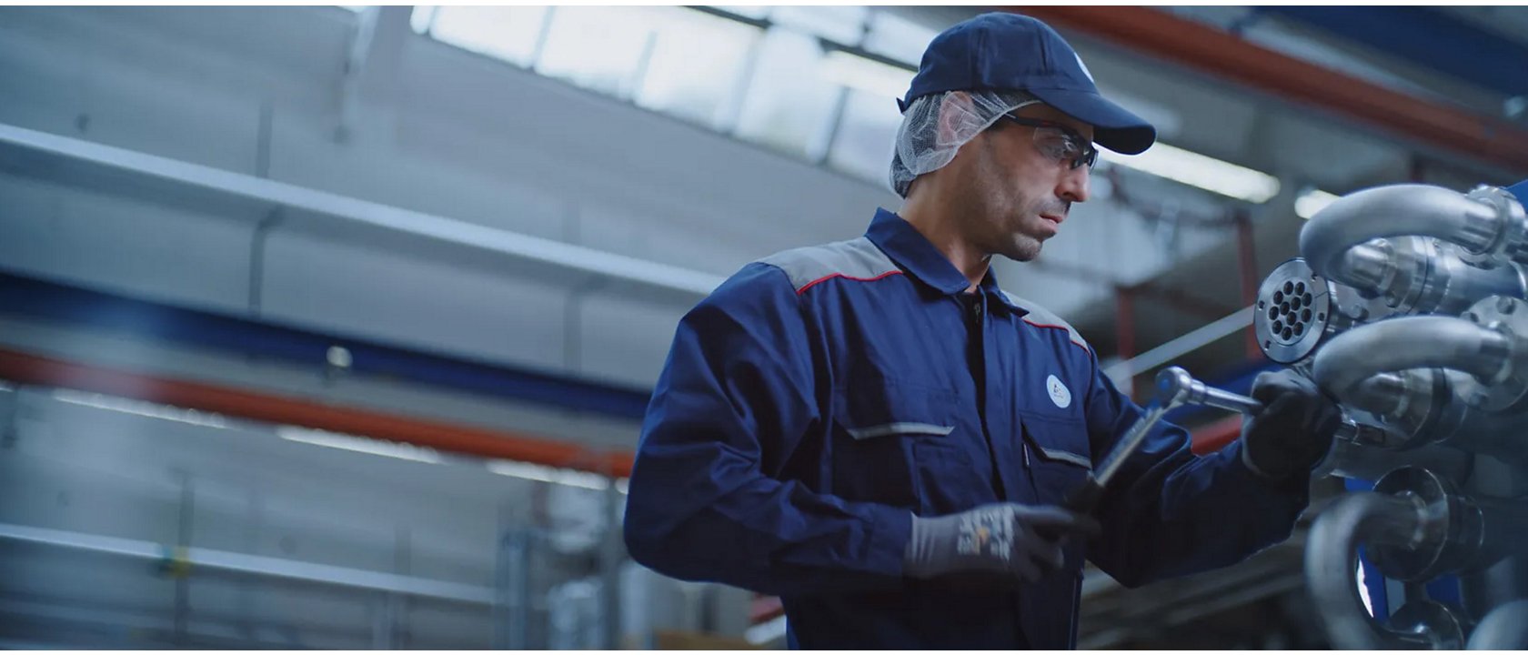 a man repairing a machine