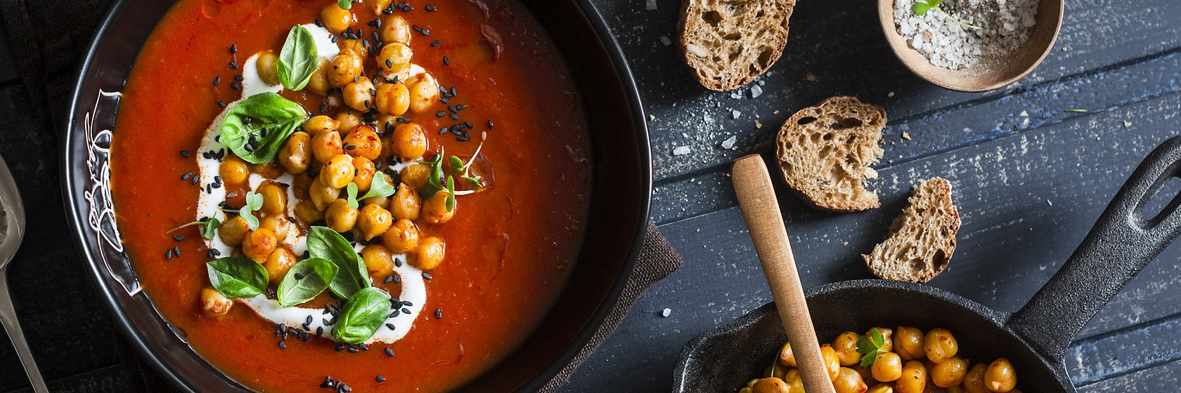 Food on table with soup and bread